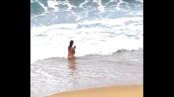 nude beach voyeur spies on a perky breasted nudist